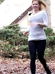 15 pictures - Playful babe nearly wets her panties outside