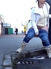 15 pictures - Two girlfriends piss in public next to bus stop