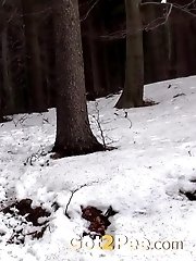 15 pictures - Hot brunette nearly pisses herself in the snow
