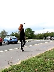 15 pictures - Pretty babe in glasses pisses outside