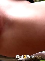 15 pictures - Blonde in short black skirt pees from high chair
