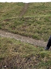 15 pictures - Dark haired babe pisses in the countryside