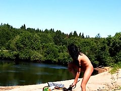 16 pictures - Exciting teen peeing naked near the lake