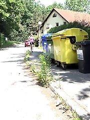 15 pictures - European babe pisses next to recycling bins