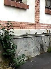 15 pictures - Sexy brunette lifts up her dress to piss