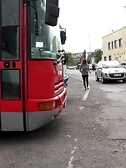 15 pictures - Busty brunette pees behind a bus
