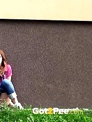 15 pictures - Redhead squats right down to piss