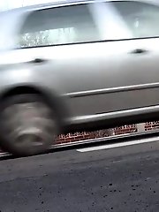 15 pictures - Brunette girl needs to pee while walking by a road