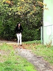 15 pictures - Exotic looking babe is desperate to piss outside