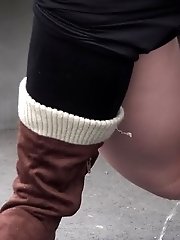 15 pictures - Chubby redhead leaves a puddle of piss behind