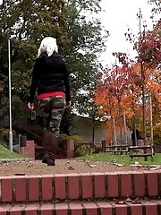 15 pictures - Pretty blonde pisses on the ground outside