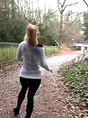 15 pictures - Playful babe nearly wets her panties outside
