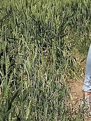 15 pictures - Brunette babe is desperate to pee while outside