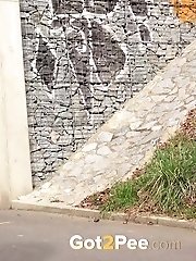 15 pictures - Short haired babe sprays her piss over the ground