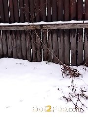 15 pictures - Watch the snow melt as this dark haired babe pees
