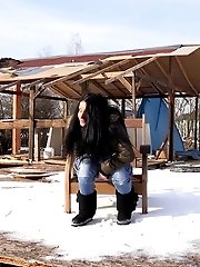 15 pictures - Dark haired babe sprinkles piss on the snow