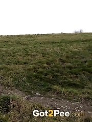 15 pictures - Dark haired babe pisses in the countryside