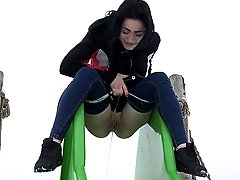 0  - Raven haired Selena pisses in a public park