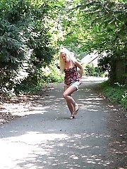 15 pictures - Public pissing for hot blonde on cycle path