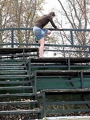 15 pictures - Sexy brunette sprays her piss outside