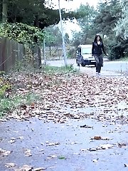 15 pictures - Dark haired babe pisses on a path