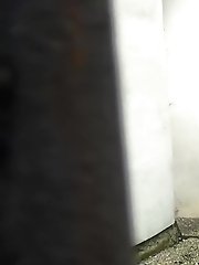 15 pictures - Toned brunette takes off her shorts to piss outside