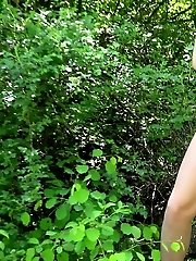 15 pictures - Stunning raven haired babe enjoys a pee standing