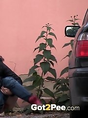 15 pictures - Hot dark haired girl pisses outside