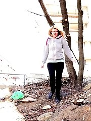 15 pictures - Cute blonde in glasses pisses over the ground
