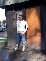 15 pictures - Pretty brunette pisses in public by the airport