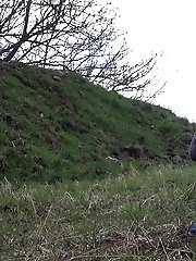 15 pictures - Shy teen pisses behind a parked car on the grass