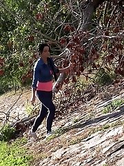 15 pictures - Stunning dark haired girl pees on the grass