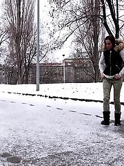 15 pictures - Dark haired babe turns the snow yellow