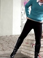 15 pictures - Cute girl in boots pisses outside in the city