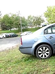 15 pictures - Exotic babe squats behind parked car to piss